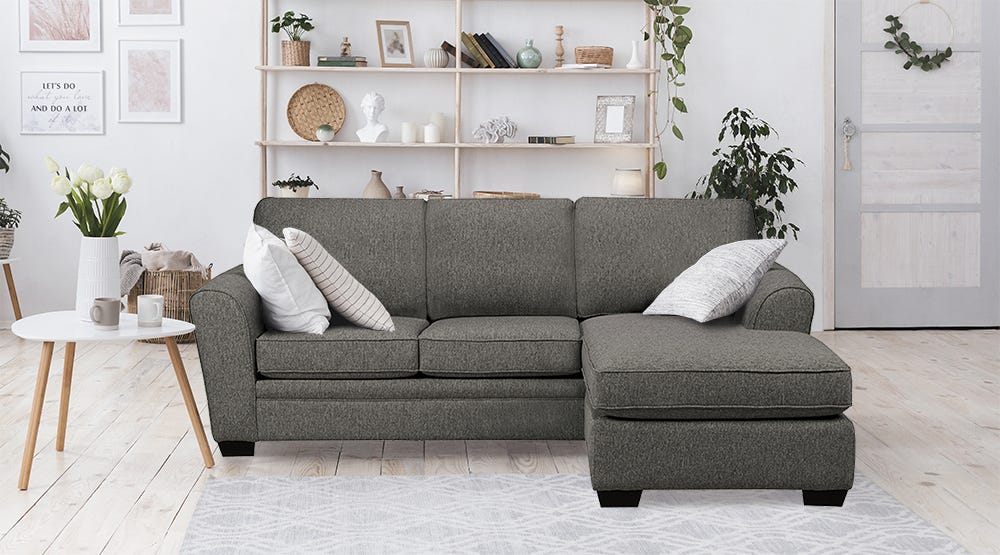 Gray fabric sectional with left-sided chaise lounge.